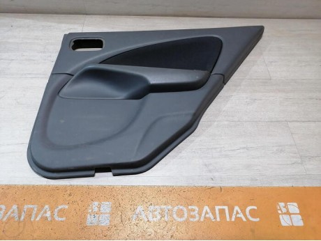 Almera Classic обшивка двери задняя правая эл