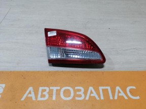 Almera G15 №11 фонарь в крышку багажника левый