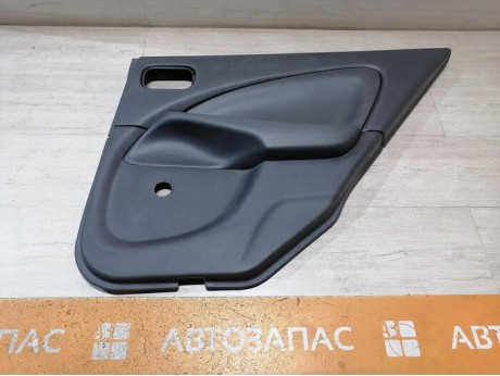 Almera Classic обшивка двери задняя правая мех