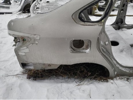 Almera G15 №12 крыло заднее правое деф