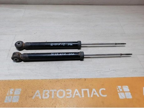 Almera G15 амортизатор задний