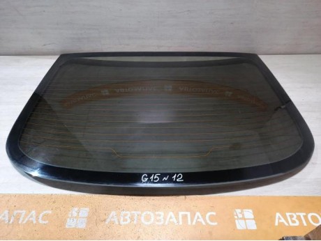 Almera G15 №12 стекло заднее 12 деф