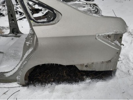 Almera G15 №12 крыло заднее левое деф