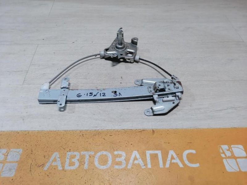 Almera G15 стеклоподъемник задний левый мех.