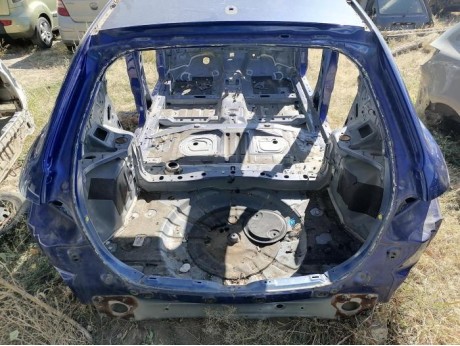 Mazda CX7 панель задняя ниша под запаску