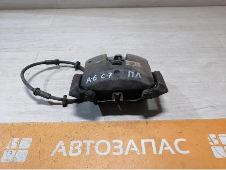 Audi A6 C7 суппорт тормозной передний левый