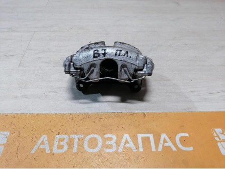 Passat B7 суппорт передний левый