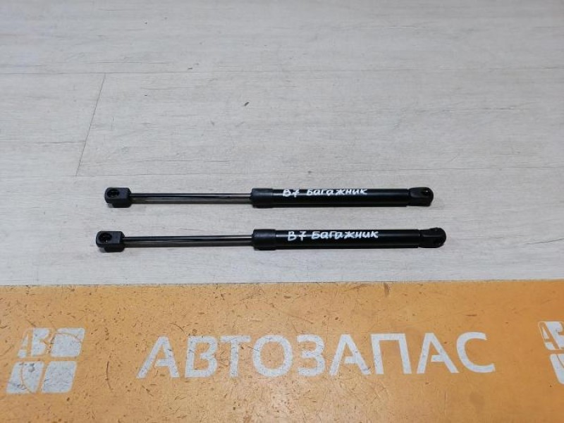 Passat B7 амортизатор крышки багажника