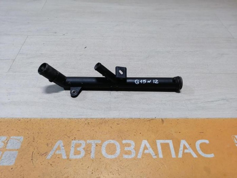 Almera G15 №12 трубка охлаждения двигателя на помпу 16кл K4M