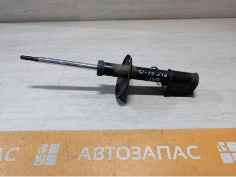Almera G15 №12 амортизатор передний