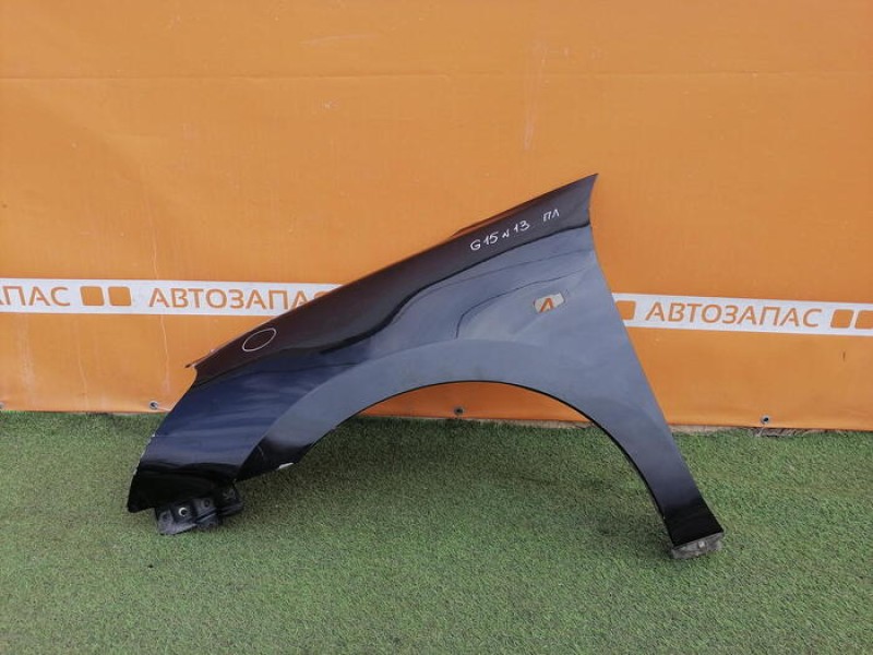 Almera G15 №13 крыло переднее левое деф