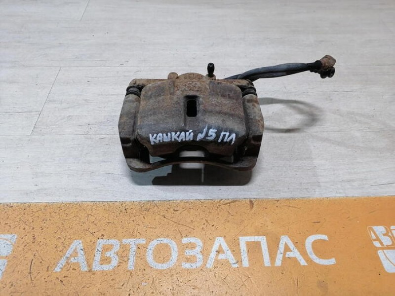 Qashqai №5 суппорт передний левый