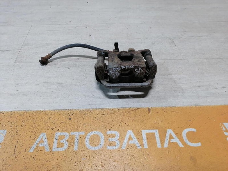 Qashqai №5 суппорт задний левый