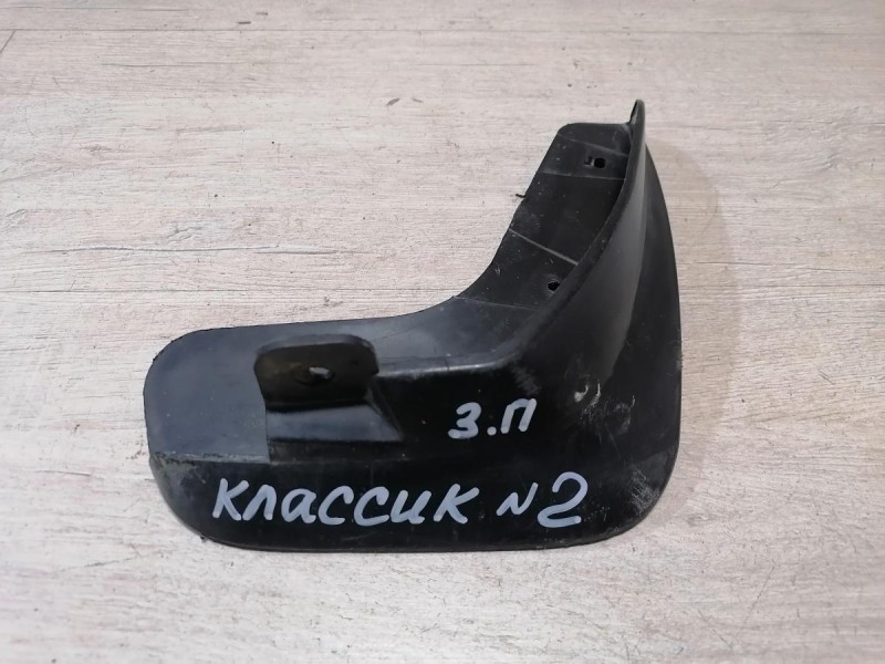 Almera Classic №2 брызговик задний правый