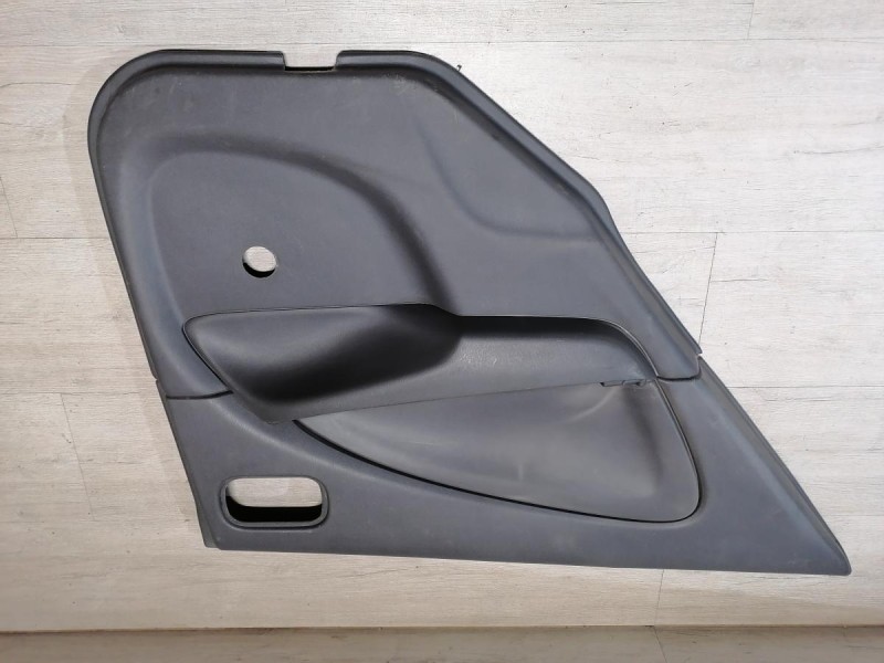 Almera Classic №2 обшивка двери задняя левая деф