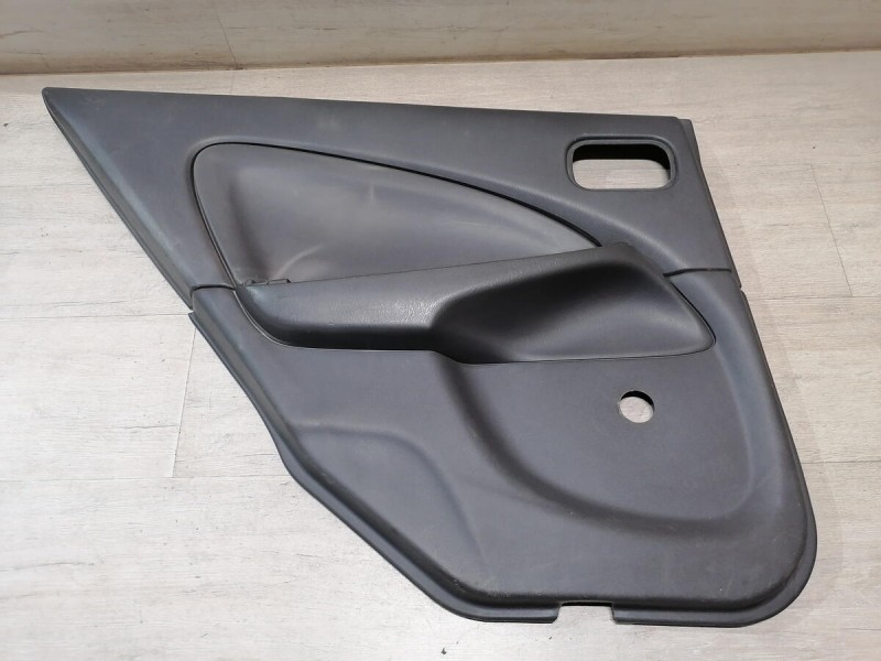 Almera Classic обшивка двери задняя левая деф