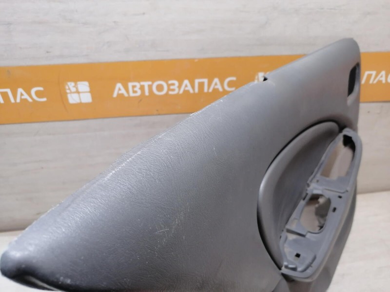Almera Classic обшивка двери задняя левая деф