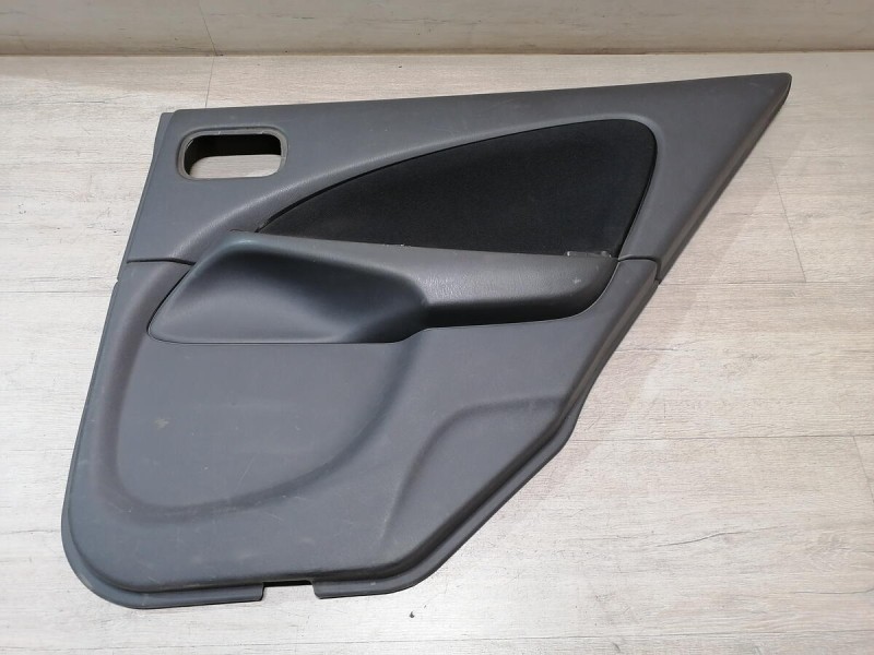 Almera Classic обшивка двери задняя правая эл