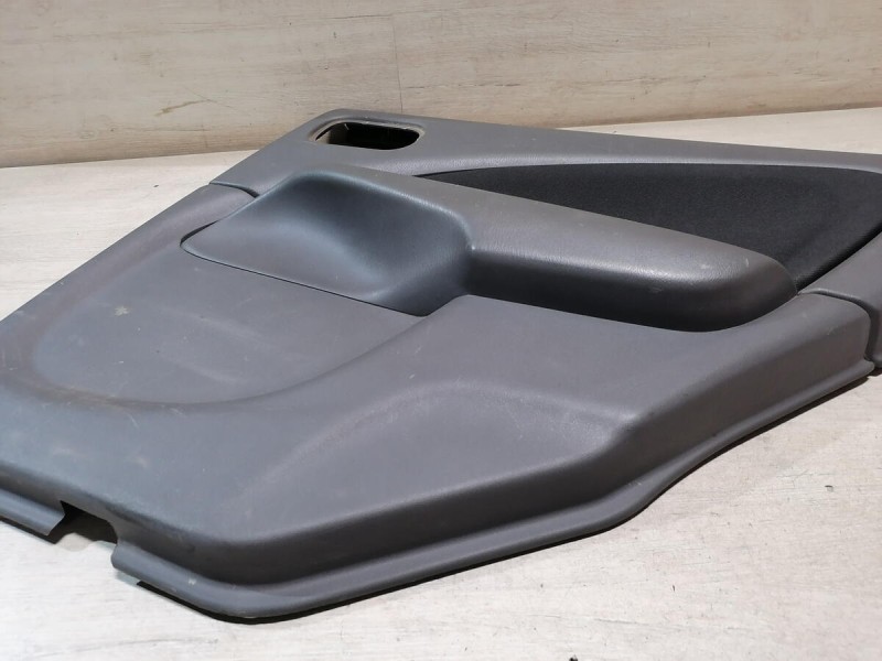 Almera Classic обшивка двери задняя правая эл