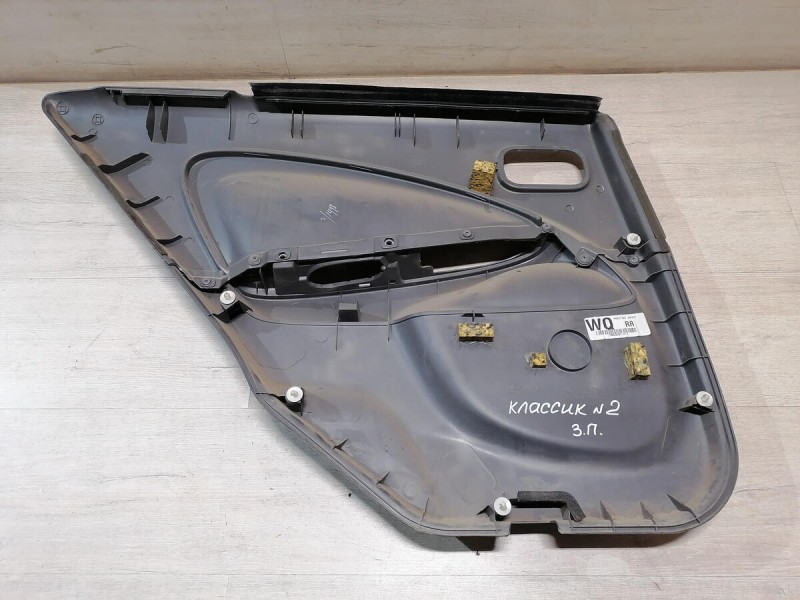 Almera Classic обшивка двери задняя правая эл