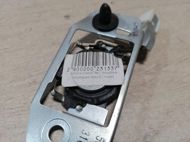 Almera Classic №2 пищалка в переднюю стойку левая