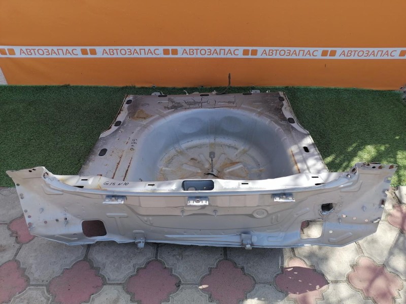 Almera G15 №10 панель задняя ниша под запаску