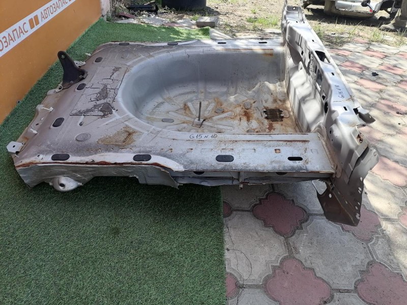 Almera G15 №10 панель задняя ниша под запаску