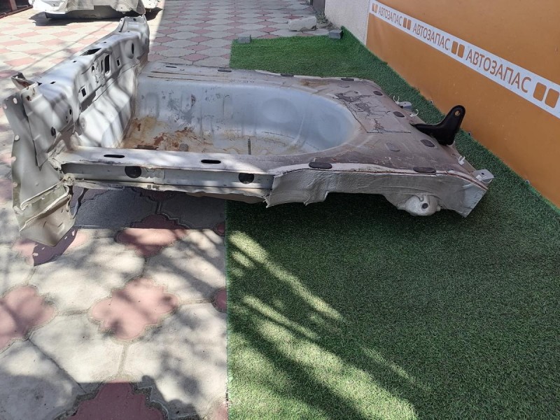 Almera G15 №10 панель задняя ниша под запаску