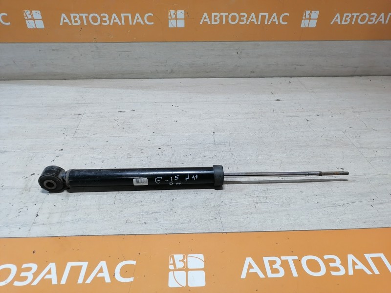 Almera G15 №11 амортизатор задний