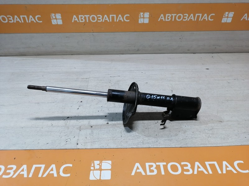Almera G15 №11 амортизатор передний