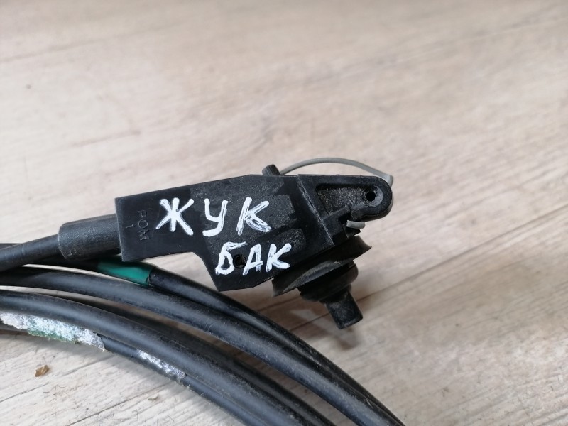 Juke трос лючка бензобака