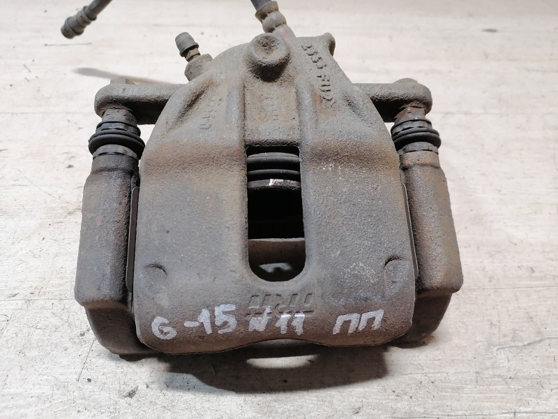 Almera G15 №11 суппорт передний правый