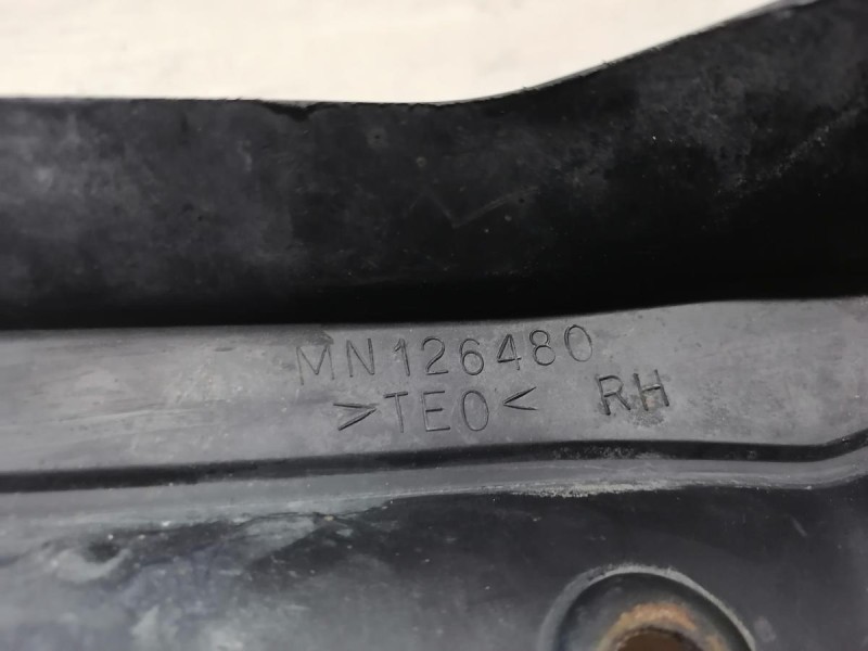 Lancer брызговик задний правый деф