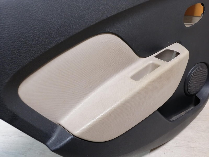 Logan 2 обшивка двери задняя левая эл черная+бежевая