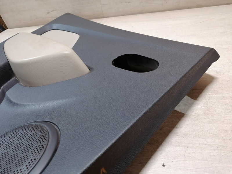 Logan 2 обшивка двери задняя левая эл черная+бежевая