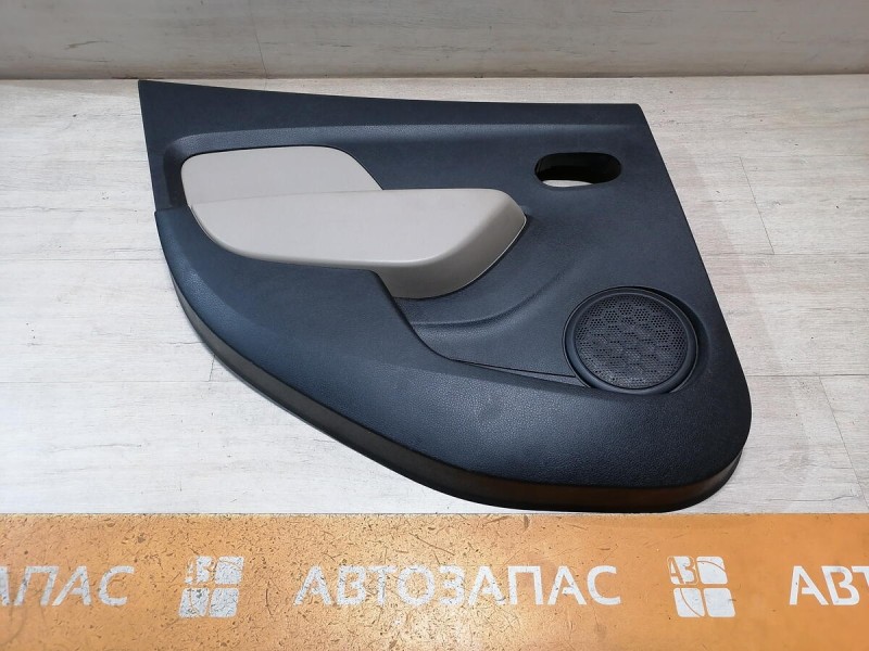 Logan 2 обшивка двери задняя левая эл черная+бежевая