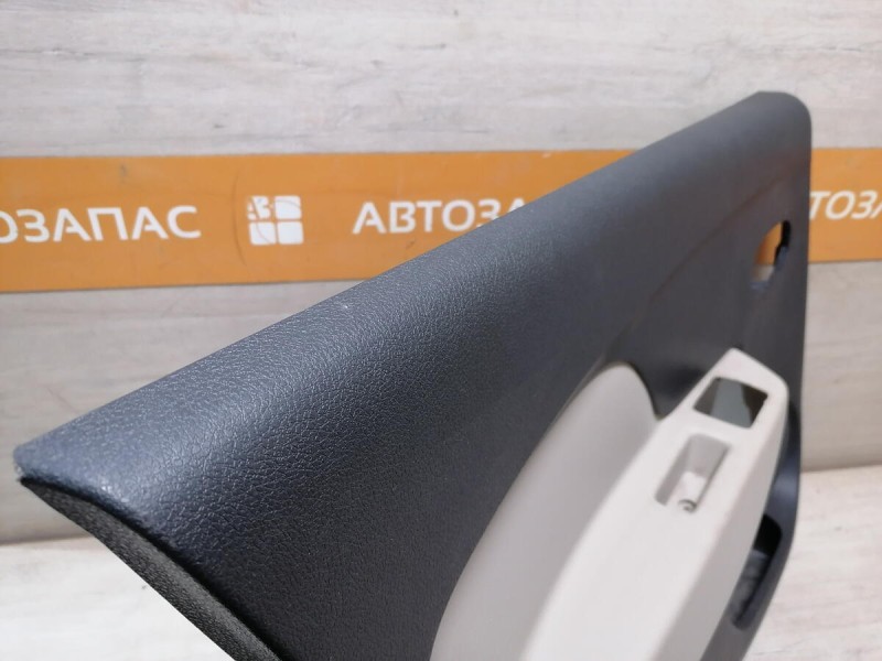 Logan 2 обшивка двери задняя левая эл черная+бежевая