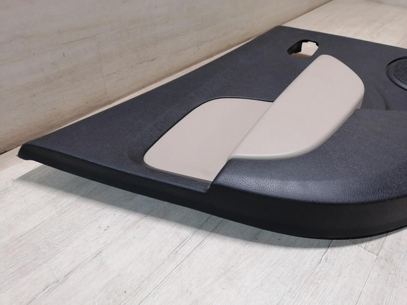 Logan 2 обшивка двери задняя левая эл черная+бежевая