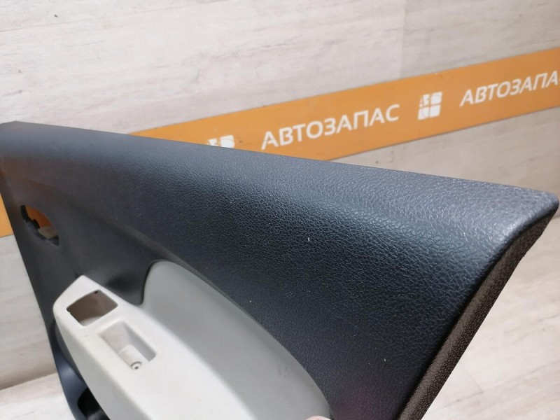 Logan 2 обшивка двери задняя правая эл черная+бежевая деф