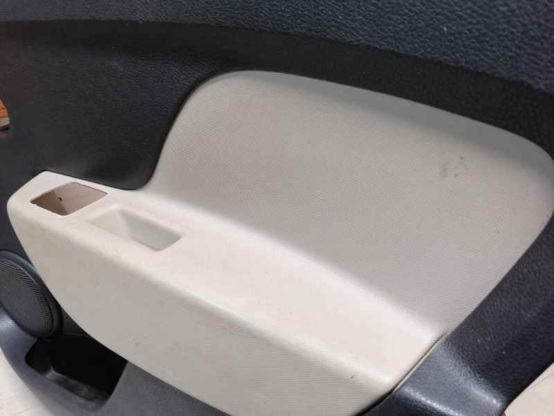 Logan 2 обшивка двери задняя правая эл черная+бежевая деф