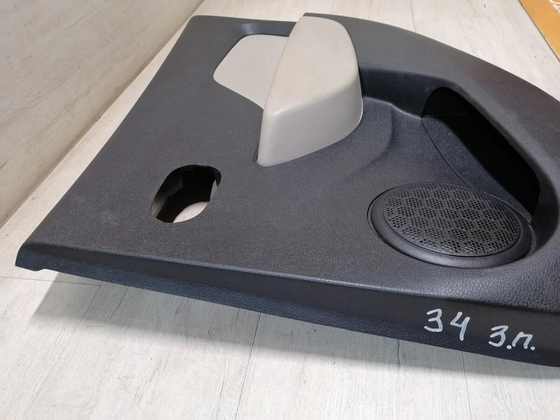 Logan 2 обшивка двери задняя правая эл черная+бежевая деф