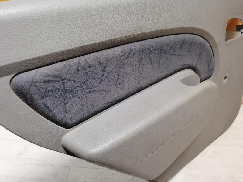 Logan ф1 обшивка двери задняя левая мех деф