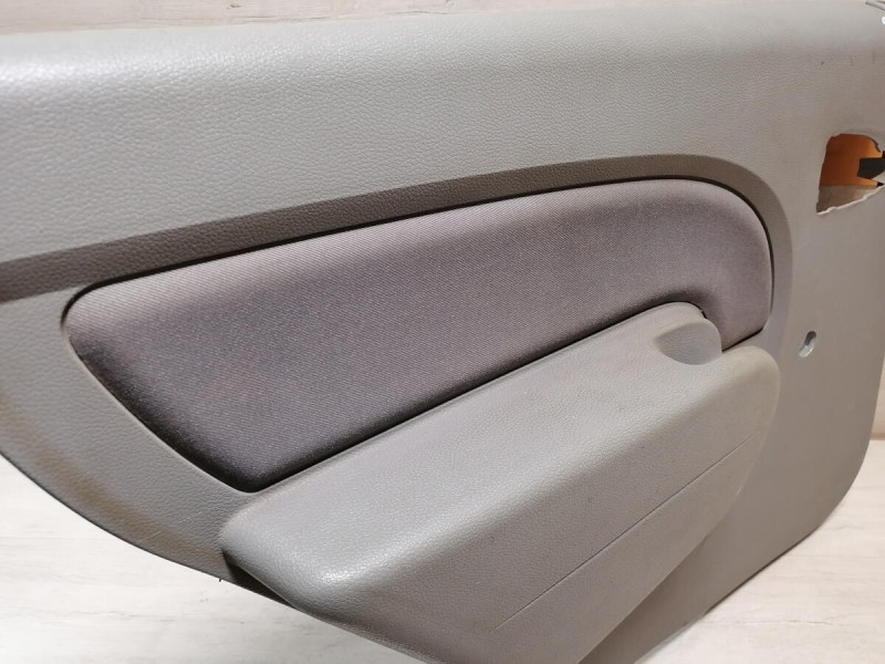 Logan ф1 обшивка двери задняя левая мех деф