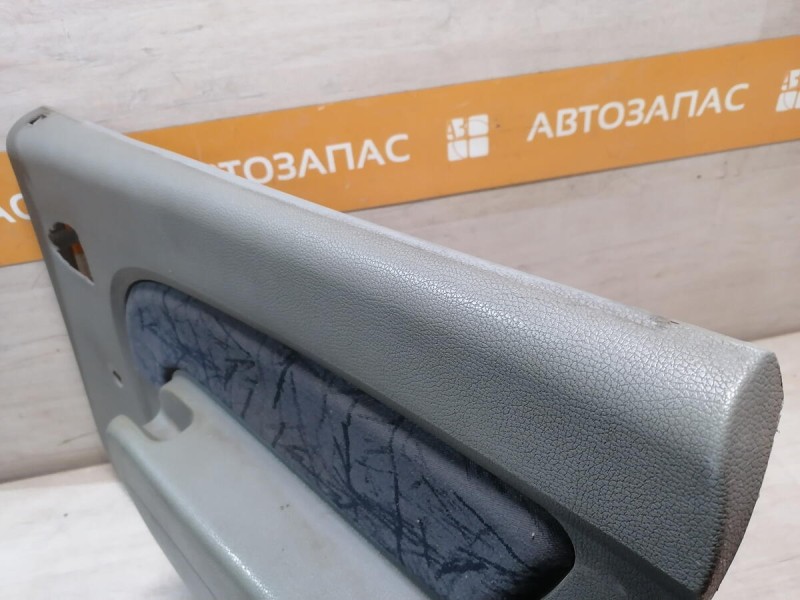 Logan ф1 №2 обшивка двери задняя правая мех деф