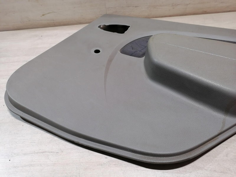 Logan ф1 №2 обшивка двери задняя правая мех деф