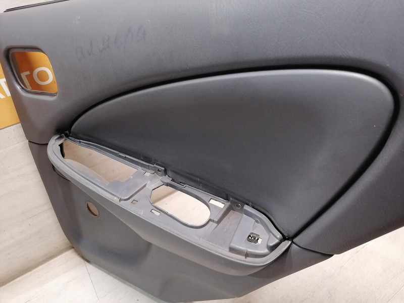 Almera Classic обшивка двери задняя правая мех