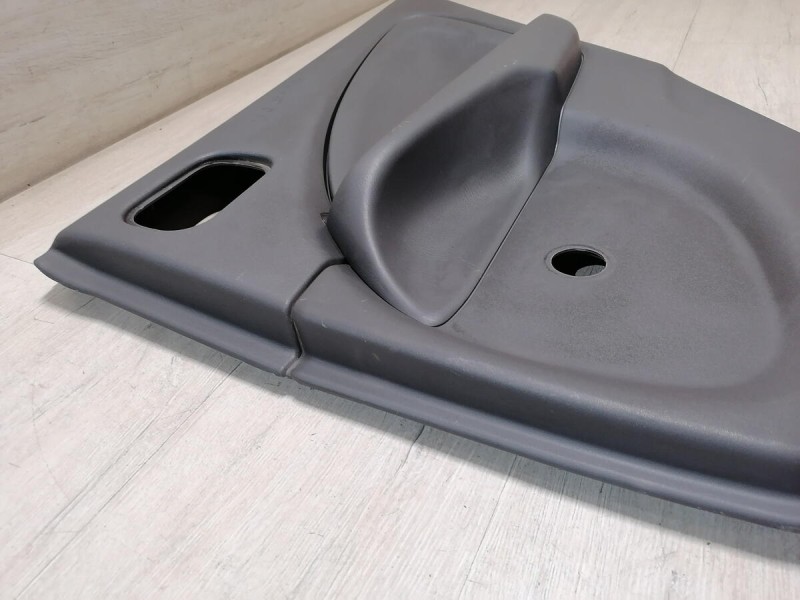 Almera Classic обшивка двери задняя правая мех