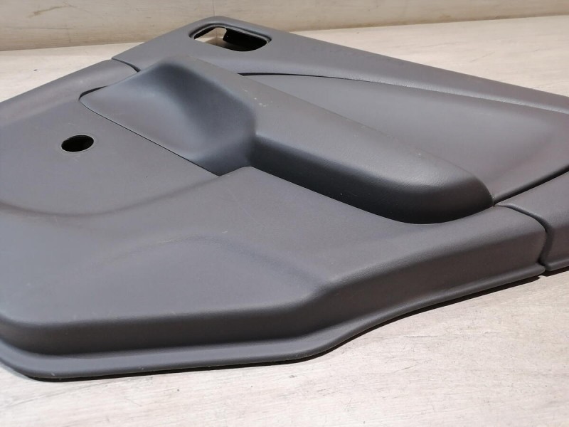 Almera Classic обшивка двери задняя правая мех