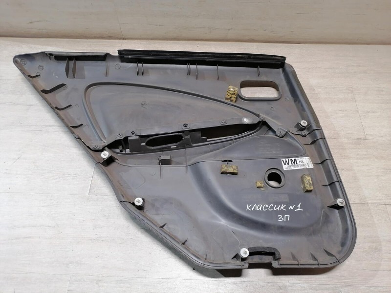 Almera Classic обшивка двери задняя правая мех