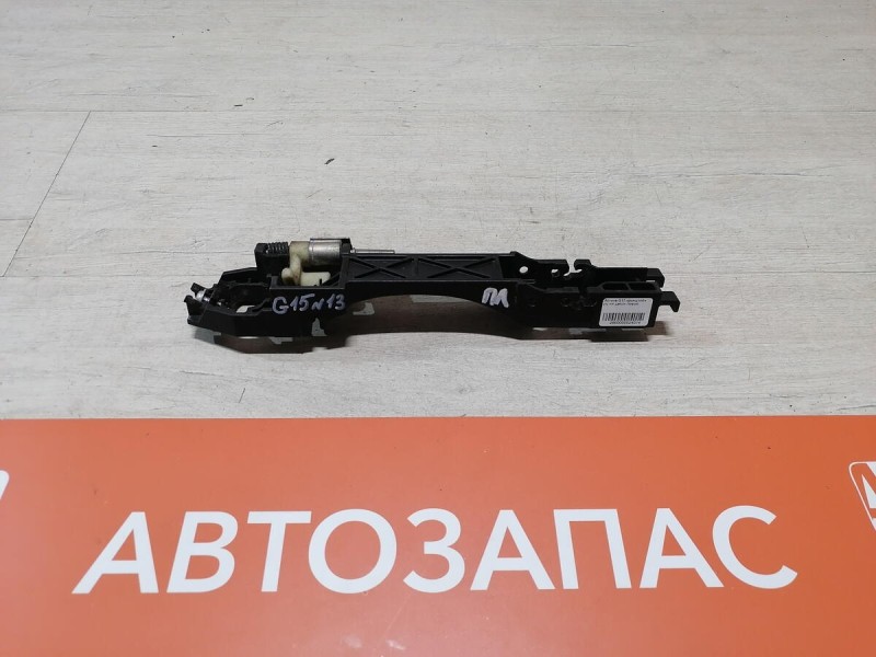 Almera G15 кронштейн ручки двери левый